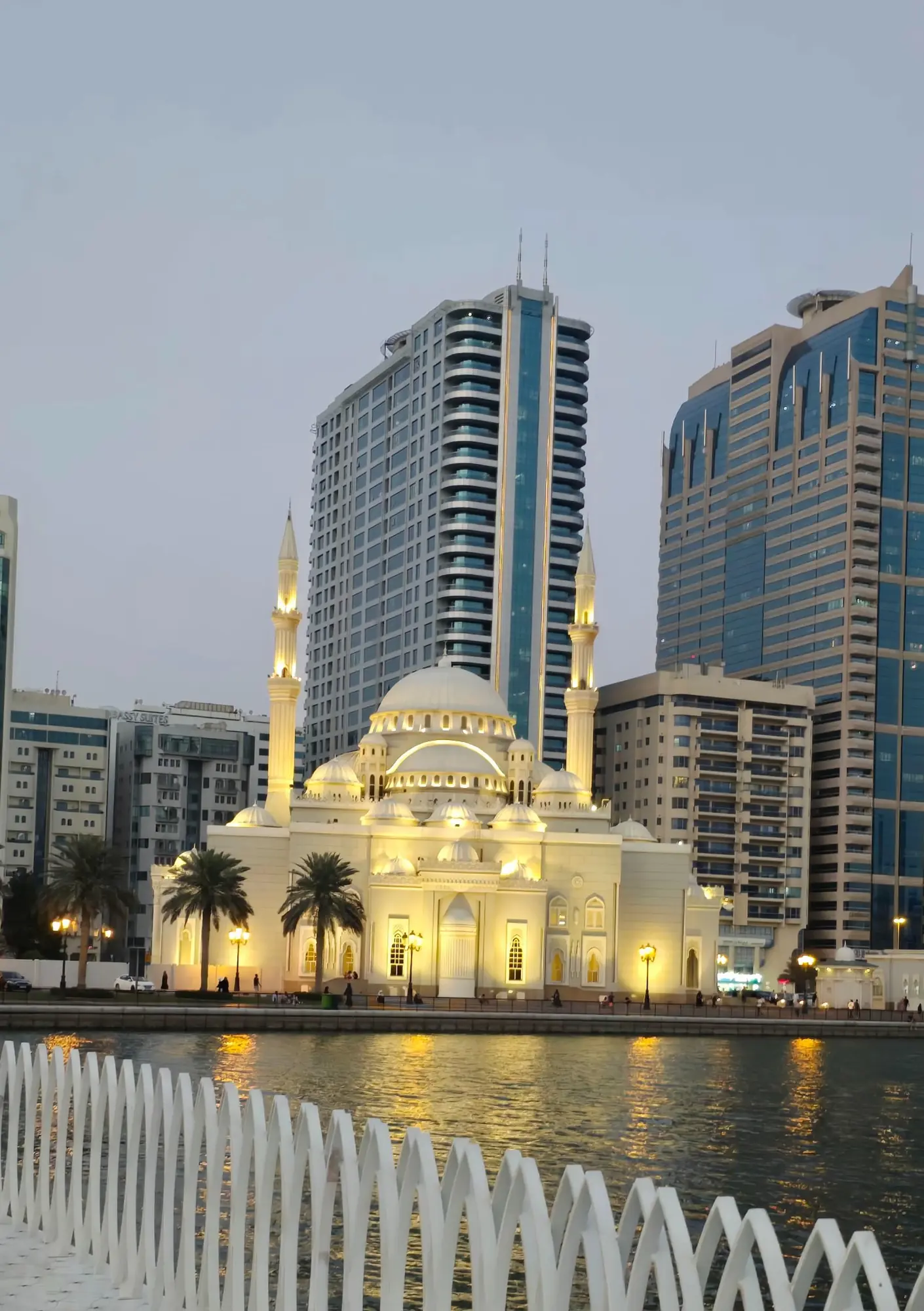 Waterfront architecture at dusk photographed during destination research.